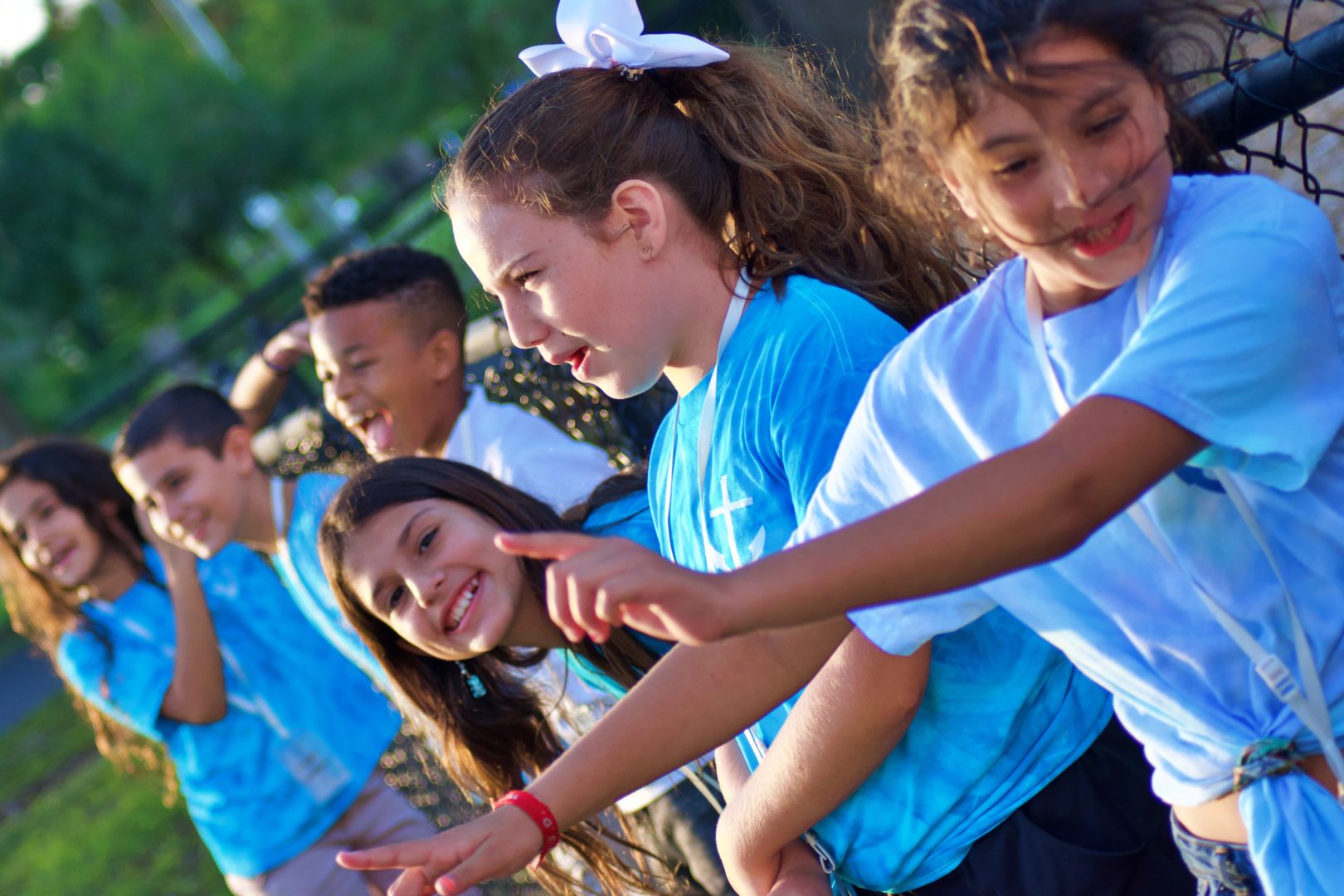 Kids laugh and play outside at The Harbor Church in Odessa, FL